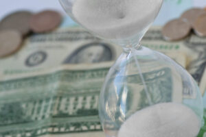 hourglass with money