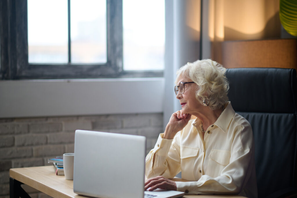 elderly woman working